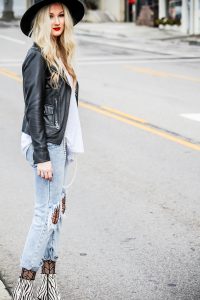 textured tights under jeans with leather jacket