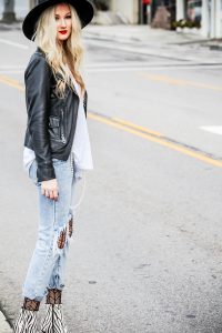 textured tights under jeans with leather jacket
